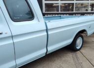 Zijkant van de laadbak van een Ford F100 SuperCab 1975